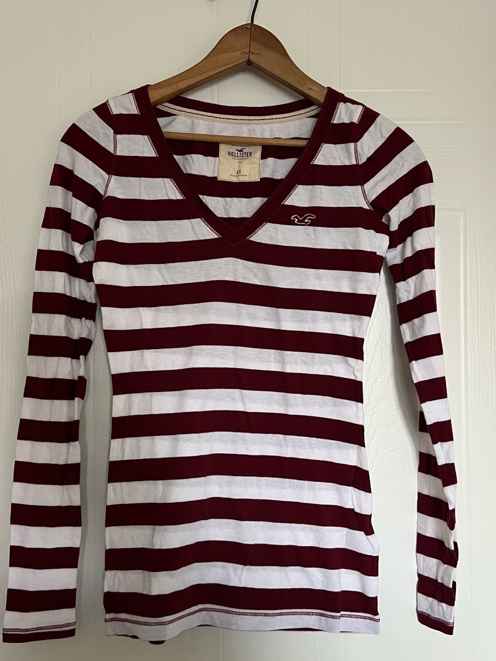 Hollister Women's Burgundy and White Striped V-Neck Long Sleeve Top